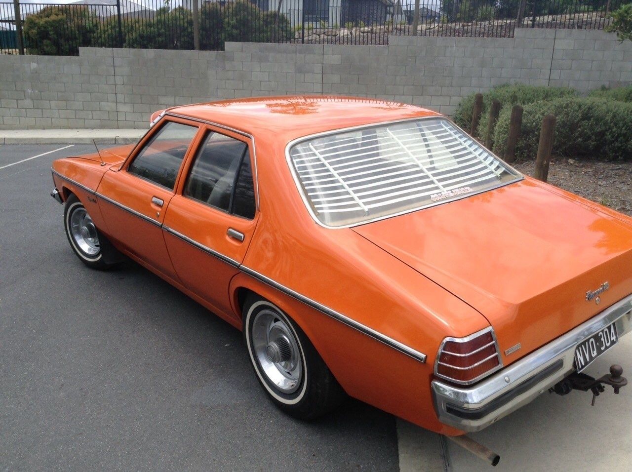HZ Holden in Valencia Orange — Kingswood SL Sedan