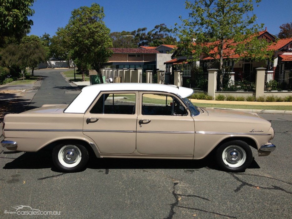 EH Holden in Fowlers Ivory over Gibson Beige — Special Sedan