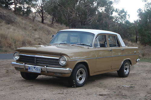 EH Holden in Fowlers Ivory over Kalgoorlie Gold — Special Sedan