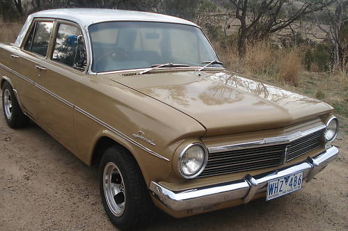 EH Holden in Fowlers Ivory over Kalgoorlie Gold — Special Sedan