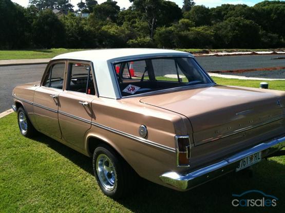 EH Holden in Fowlers Ivory over Kalgoorlie Gold — Special Sedan