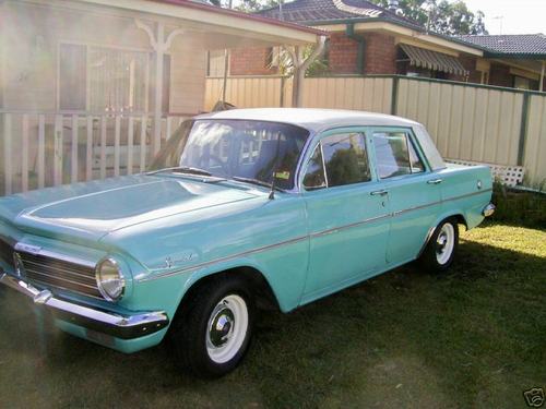EH Holden in Fowlers Ivory over Marlin Turquoise — Special Sedan