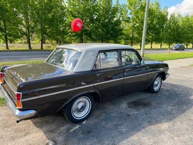 EH Holden in Windorah Beige over Royal Umber — Special Sedan
