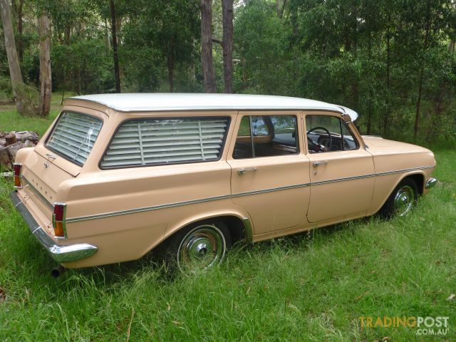 EH Holden in Fowlers Ivory over Quandong (peach) — Special Station Sedan