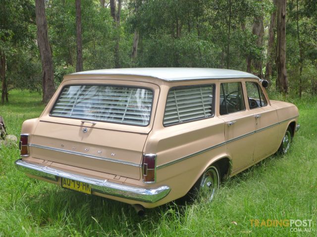 EH Holden in Fowlers Ivory over Quandong (peach) — Special Station Sedan