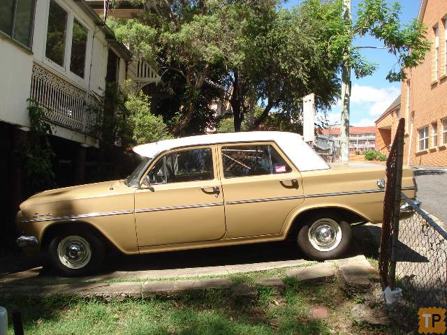 EH Holden in Fowlers Ivory over Kalgoorlie Gold — Special Sedan