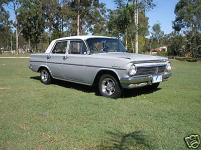 EH Holden in Fowlers Ivory over Mallacoota Grey — Special Sedan
