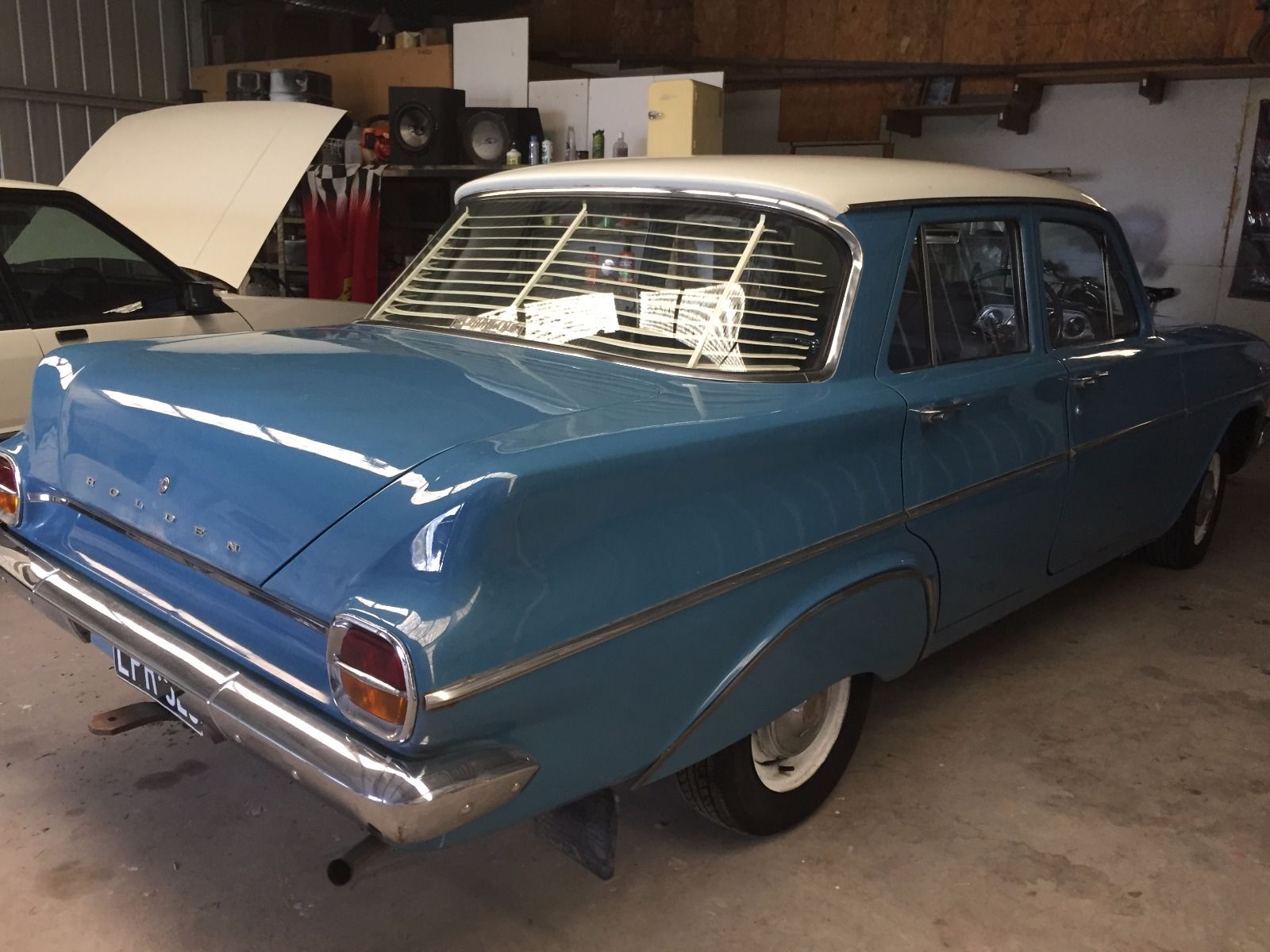 EJ Holden in Atherton Ivory over Swan River Blue — Special Sedan