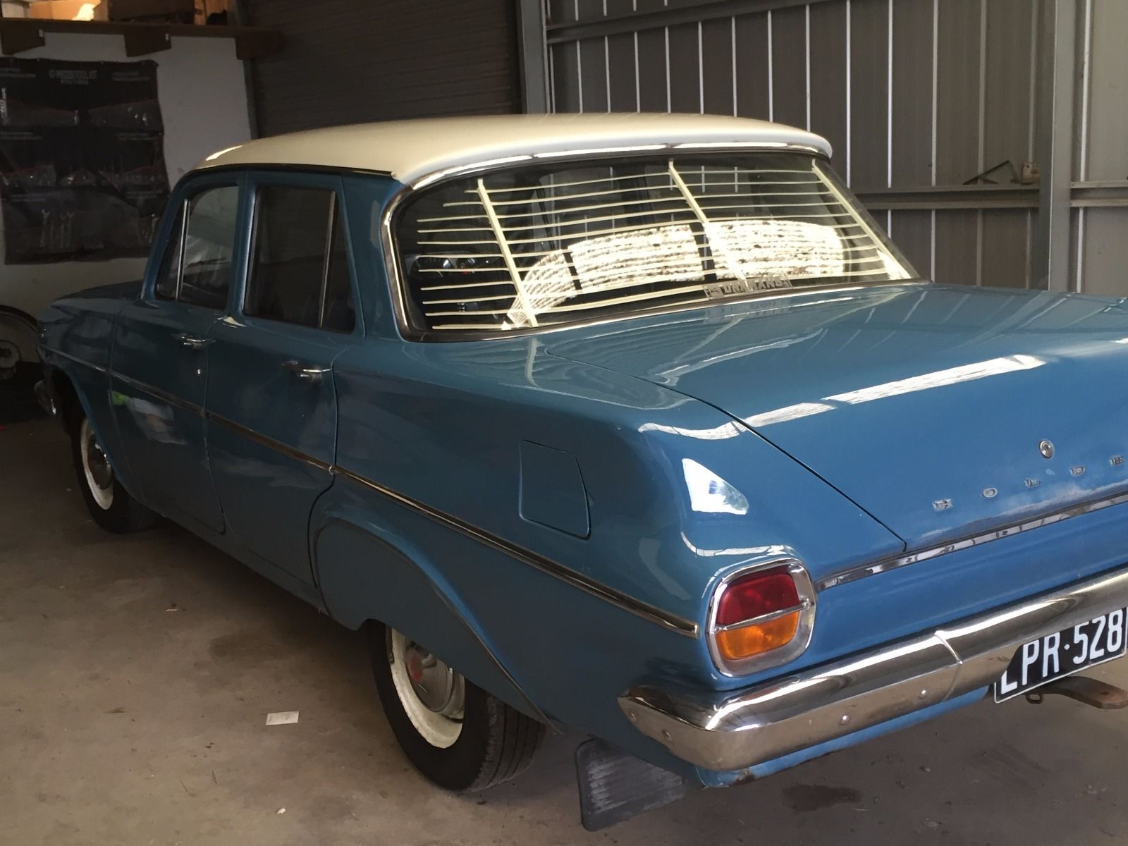 EJ Holden in Atherton Ivory over Swan River Blue — Special Sedan