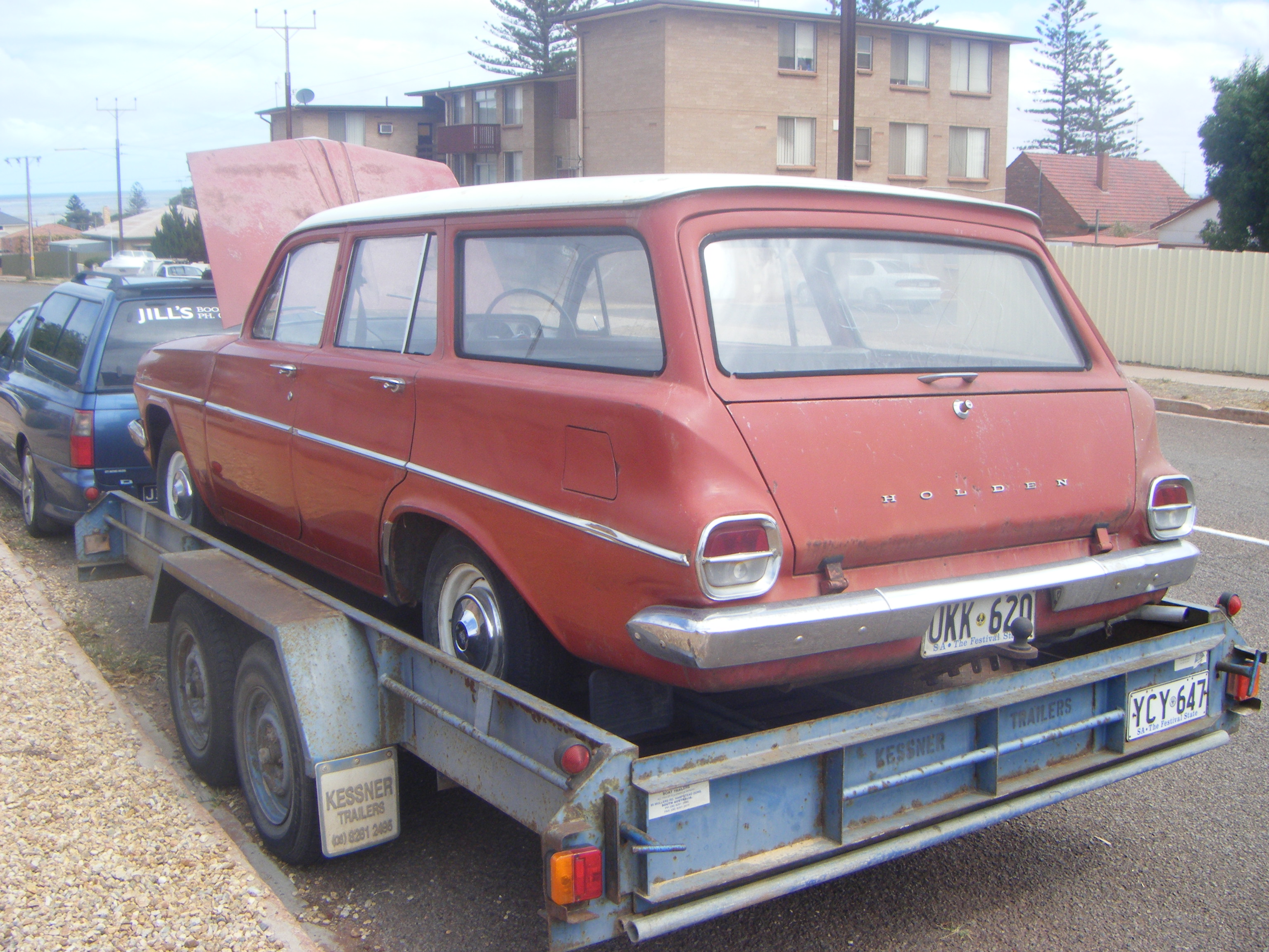 EJ Holden in Atherton Ivory over Namatjira Red — Special Station Sedan