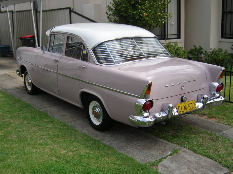 EK Holden in Snowcrest White over Cameo Beige — Special Sedan