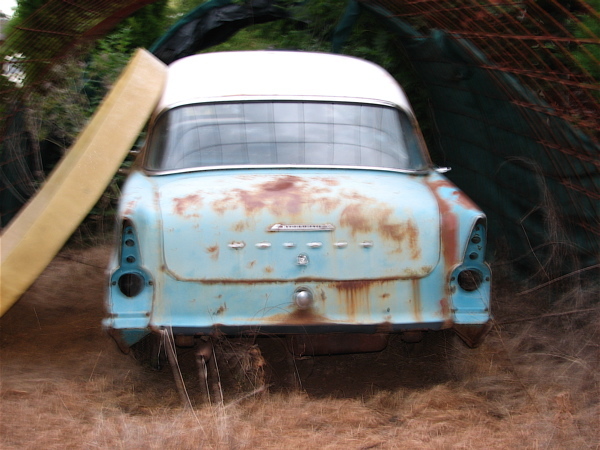 EK Holden in Snowcrest White over Twilight Turquoise — Special Sedan