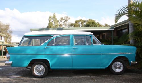EK Holden in Snowcrest White over Twilight Turquoise — Special Station Sedan