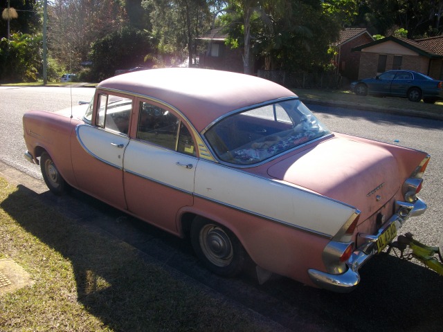 FB Holden in Pyramid Coral with Grecian White Insert — Special Sedan