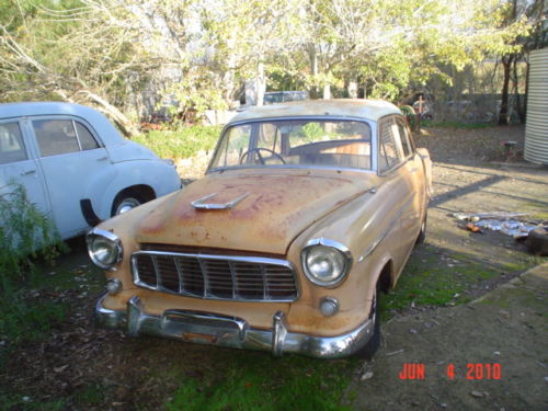 FE Holden in Magnolia Ivory over Corsair Tan — Special Sedan