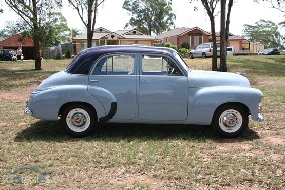 FJ Holden in Grotto Blue over Breton Blue — Special Sedan