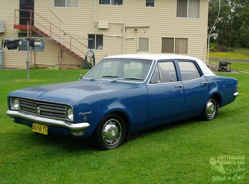 HK Holden in Ermine White over Eden Blue — Kingswood Sedan