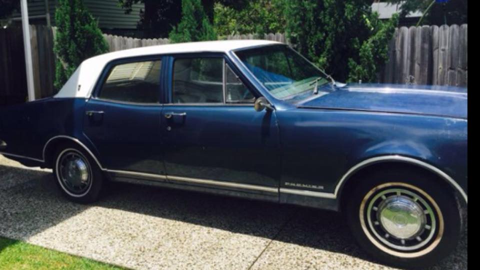 HK Holden in Grecian White over Paragon Blue Met — Premier Sedan