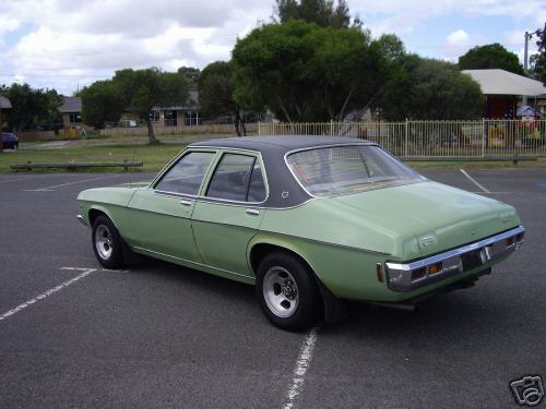 HQ Holden in Glacier White over Olive Green — Kingswood Sedan