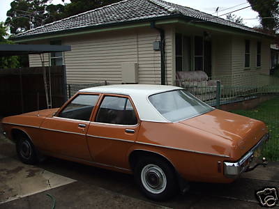 HQ Holden in Glacier White over Russet — Kingswood Sedan