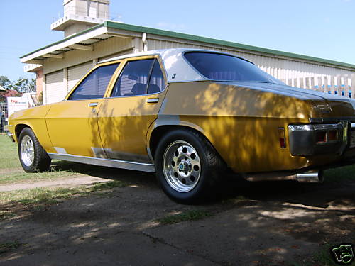 HQ Holden in Glacier White over Sunburst Met — Premier Sedan