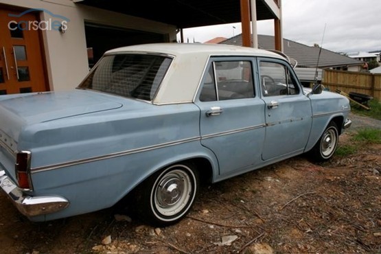 EH Holden in Fowlers Ivory over Amberley Blue — Special Sedan