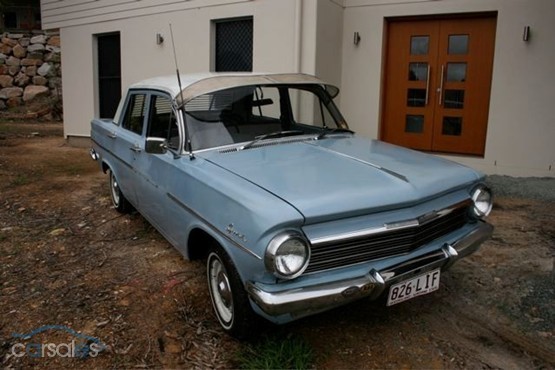 EH Holden in Fowlers Ivory over Amberley Blue — Special Sedan