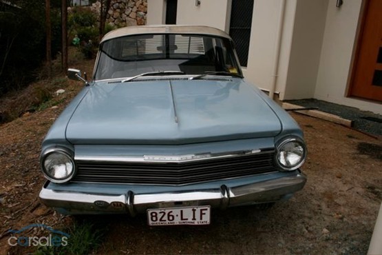EH Holden in Fowlers Ivory over Amberley Blue — Special Sedan