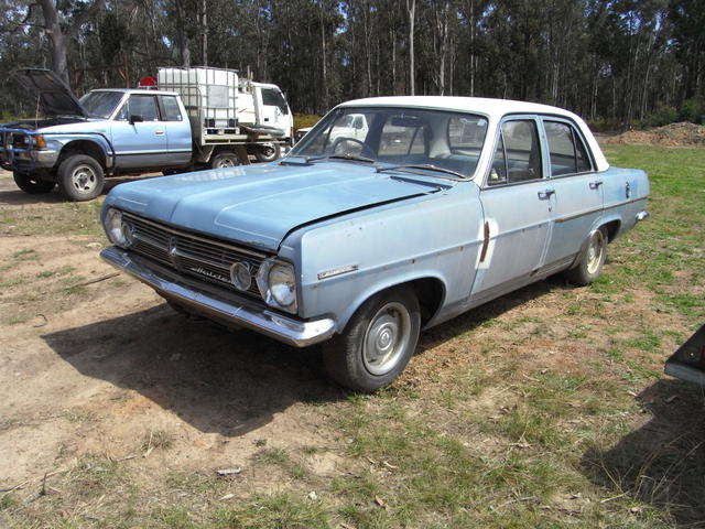 HR Holden in Grecian White over Lurline Blue — Special Sedan