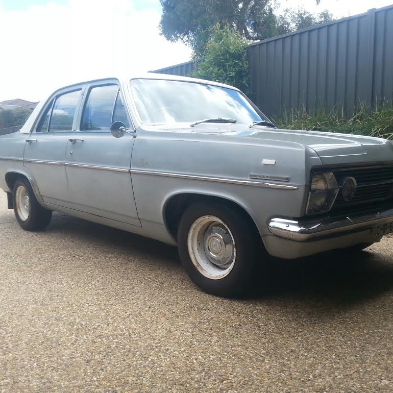 HR Holden in Grecian White over Pemberton Grey — Special Sedan
