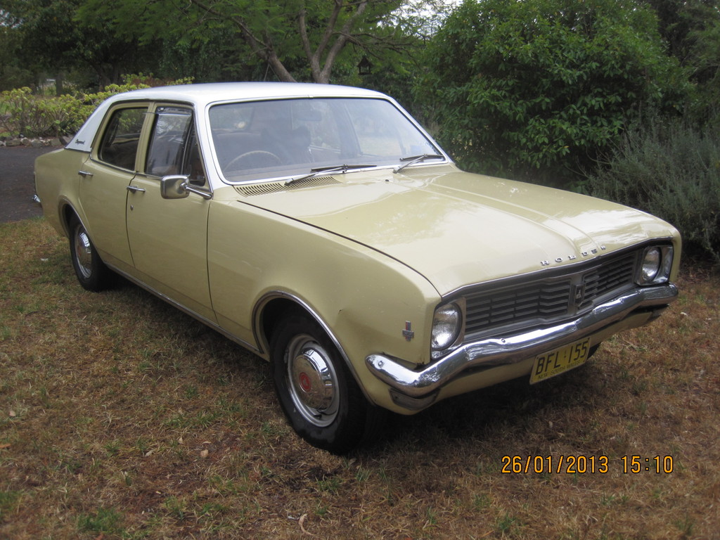 HT Holden in Kashmir White over Pharoah Gold — Kingswood Sedan