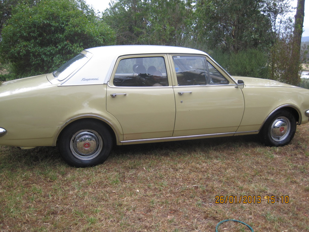 HT Holden in Kashmir White over Pharoah Gold — Kingswood Sedan