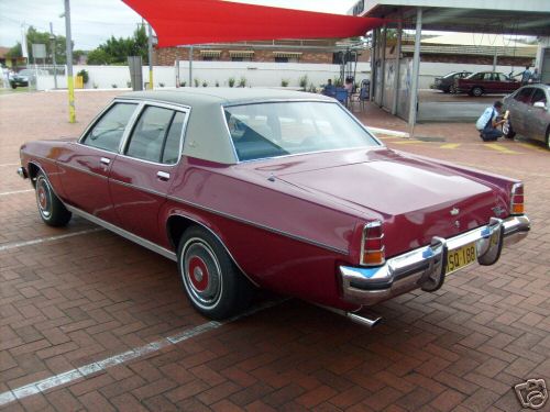HX Holden in Cortez Red Met — Statesamn Caprice Sedan
