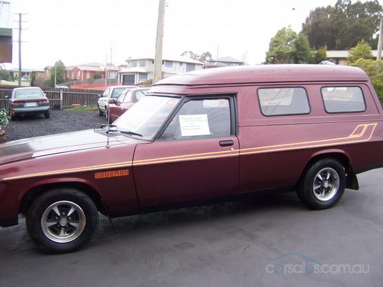 HX Holden in Burgundy Met — Sandman Panel Van