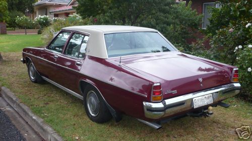 HX Holden in Cortez Red Met — Statesman DeVille Sedan
