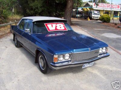 HX Holden in Cotillion White over Deauville Blue Met — Statesman DeVille Sedan