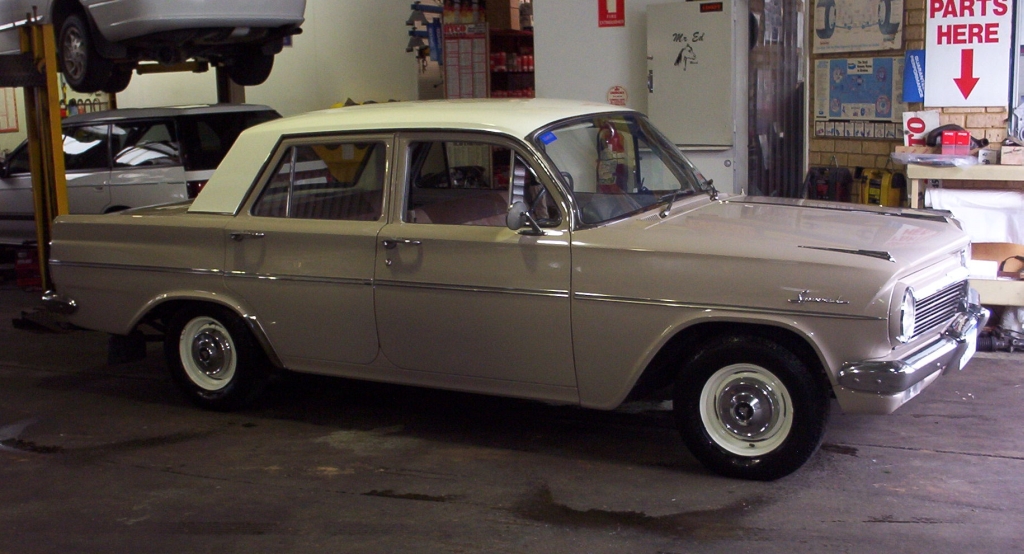 EH Holden in Fowlers Ivory over Gibson Beige — Special Sedan