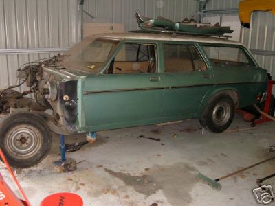 HZ Holden in Palais White over Sage Green Met