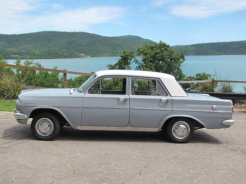 EH Holden in Fowlers Ivory over Gundagai Grey — Special Sedan