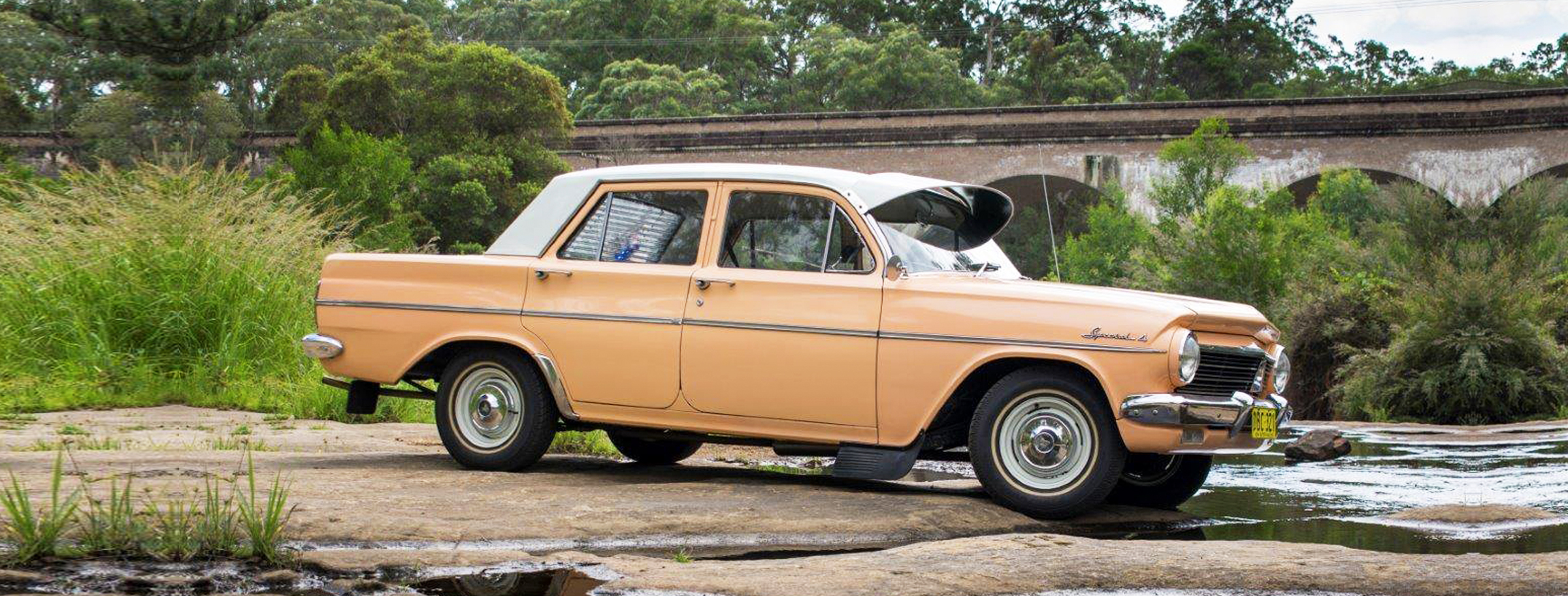 EH Holden in Fowlers Ivory over Quandong (peach) — S.4. Sedan - Manual Transmission