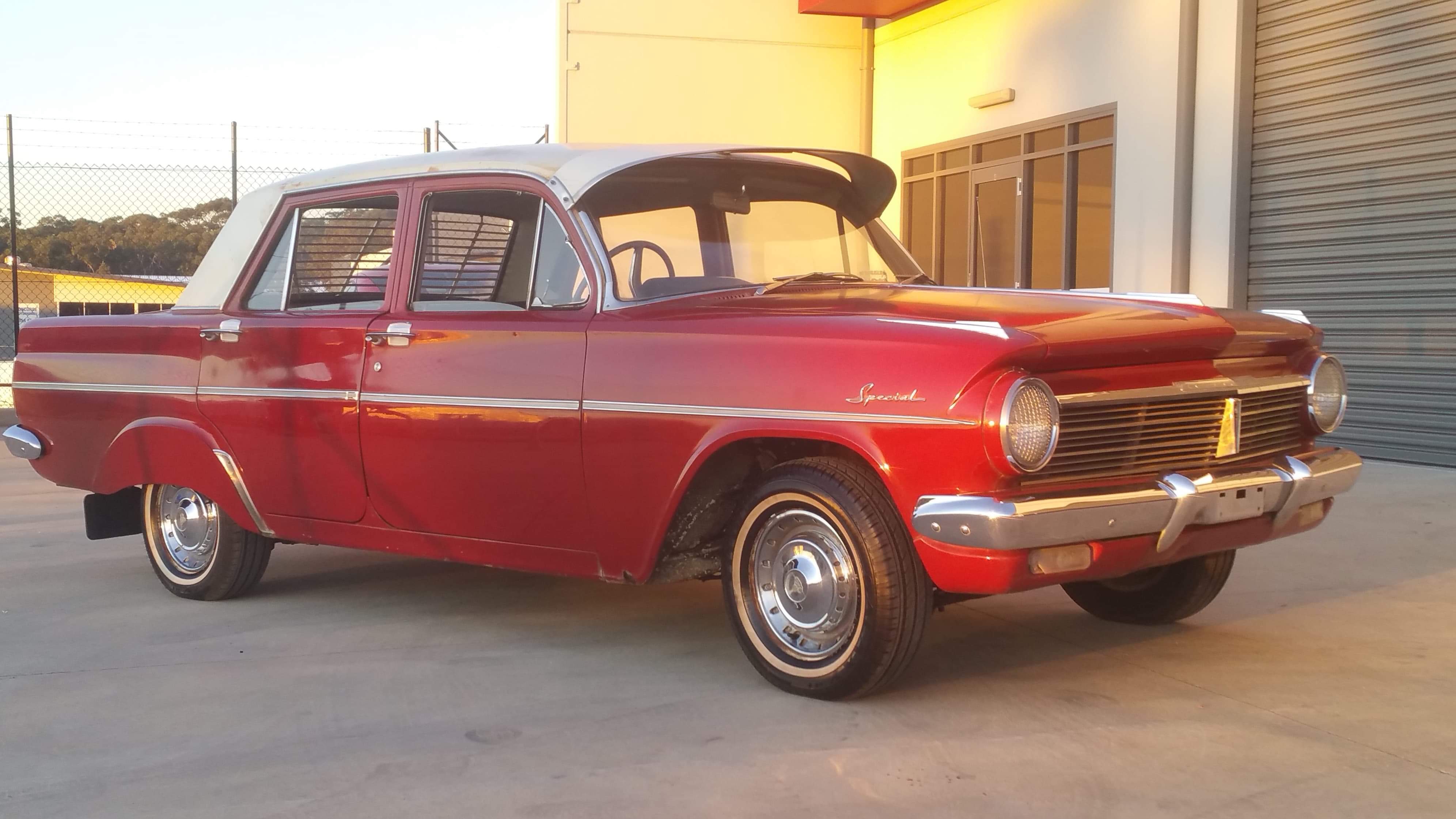 EH Holden in Fowlers Ivory over Winton Red — S.4. Sedan - Manual Transmission
