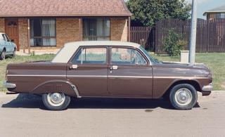 EH Holden in Windorah Beige over Royal Umber — Special Sedan