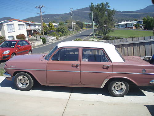 EH Holden in Fowlers Ivory over Jindabyne Mauve — Special Sedan
