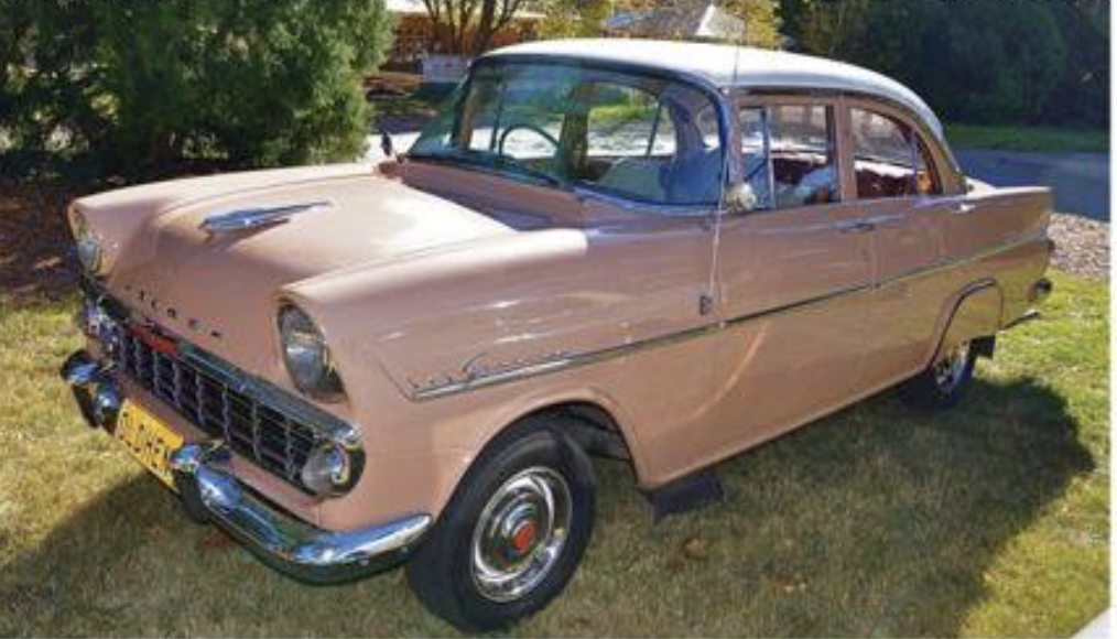 EK Holden in Snowcrest White over Alamo Beige — Special Sedan