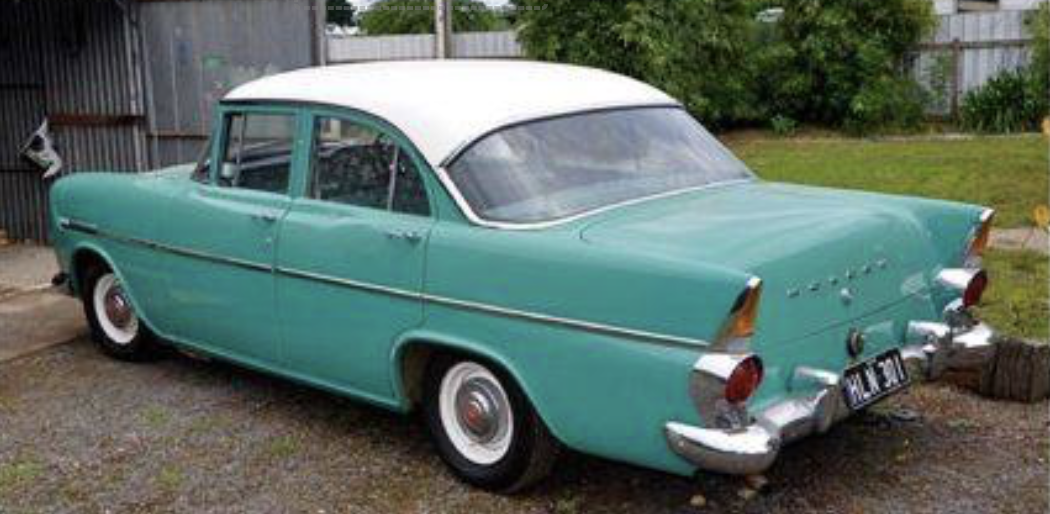 EK Holden in Snowcrest White over Opal Green — Special Sedan