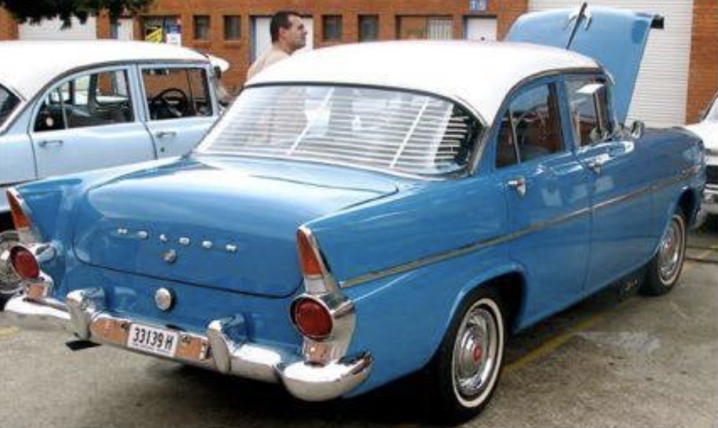 EK Holden in Snowcrest White over Shalimar Blue — Special Sedan