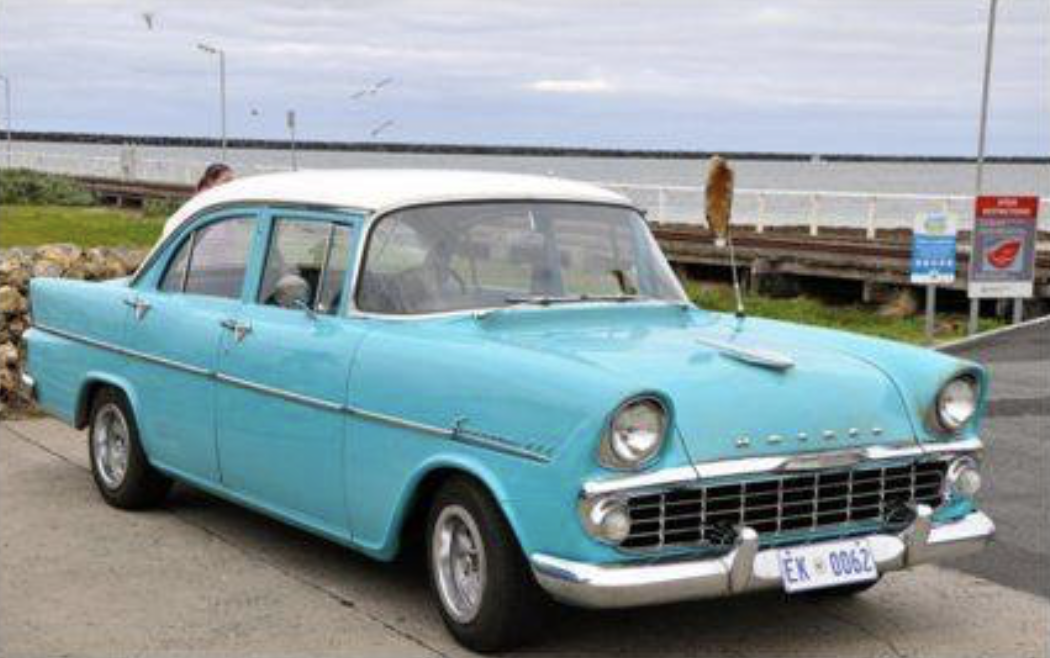 EK Holden in Snowcrest White over Tartan Turquoise — Special Sedan