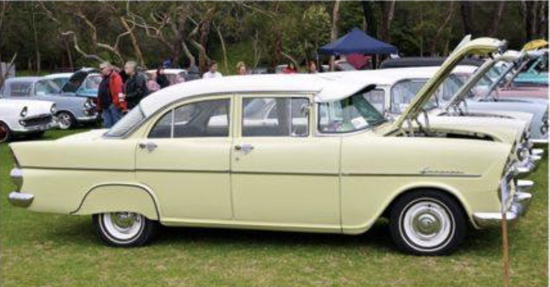 EK Holden in Snowcrest White over Tuscanny Yellow — Special Sedan