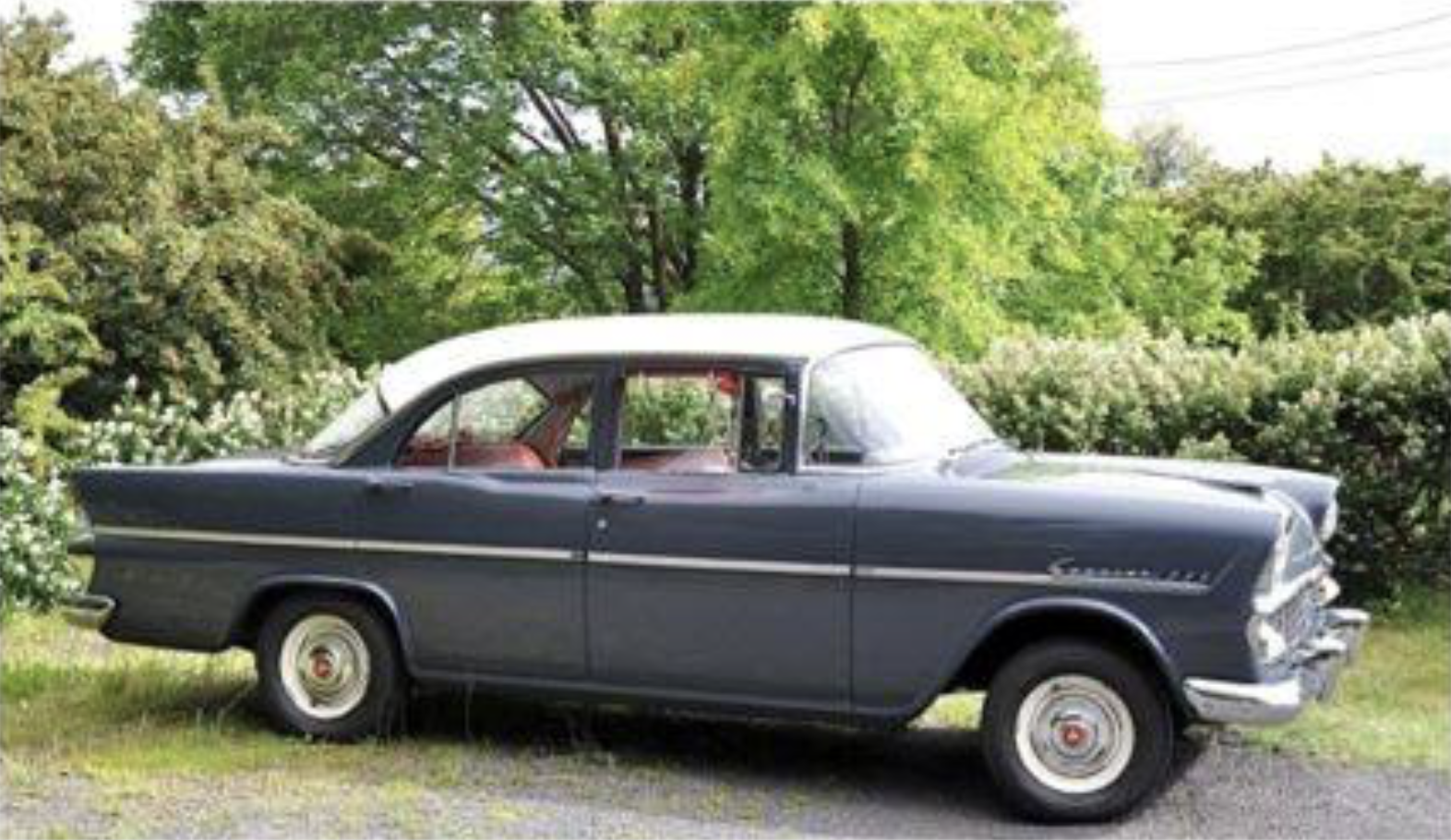 EK Holden in Snowcrest White over Cathay Grey — Special Sedan