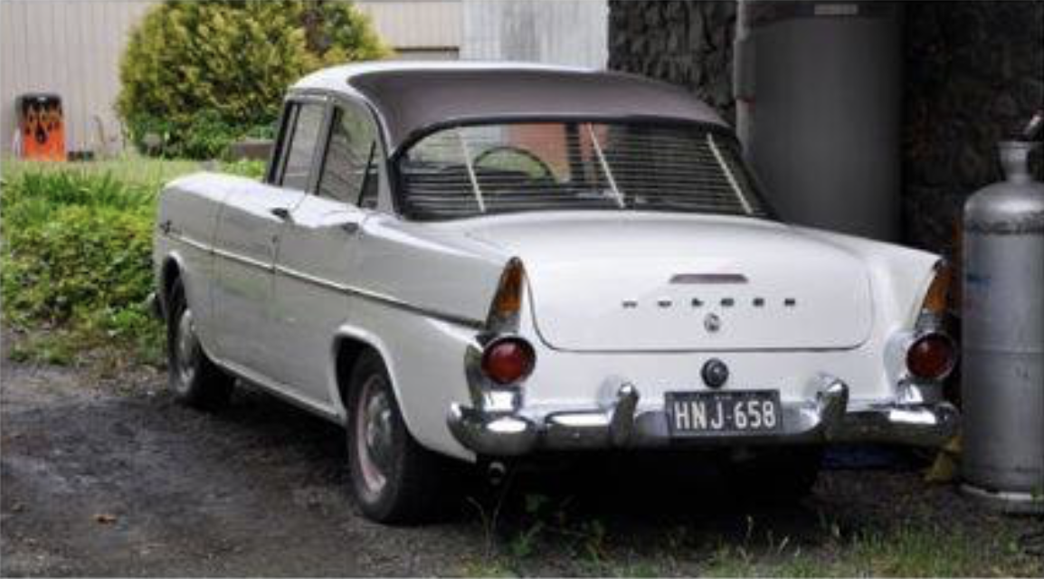 EK Holden in Cameo Beige over Snowcrest White — Special Sedan